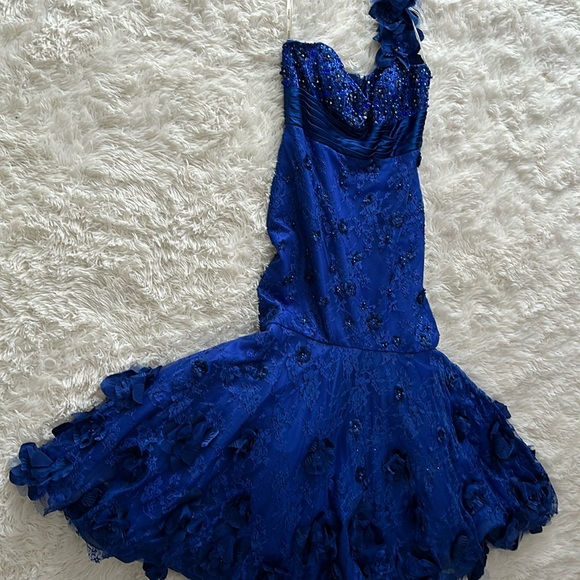 Ceremony a long bluedress. Brand Jovani. Size 12